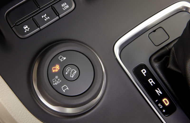 Everest’s locking differential, low range, traction control and hill descent buttons.